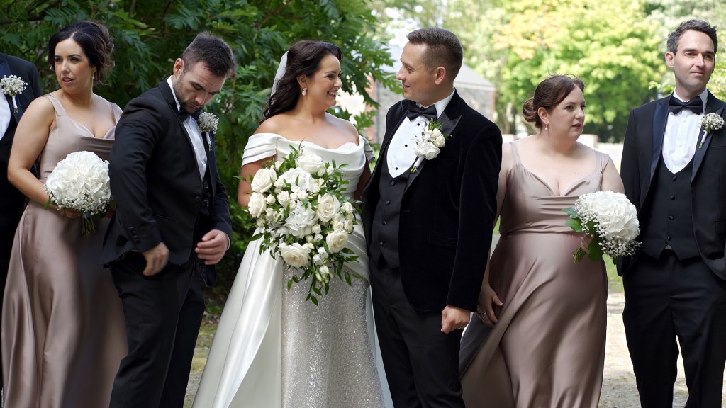 Bride Gemma and Groom Josh with their bridesmaids and groomsmen outdoors in Donegal.