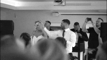 Rikita and Jordan celebrating at their wedding reception at Redcastle Hotel