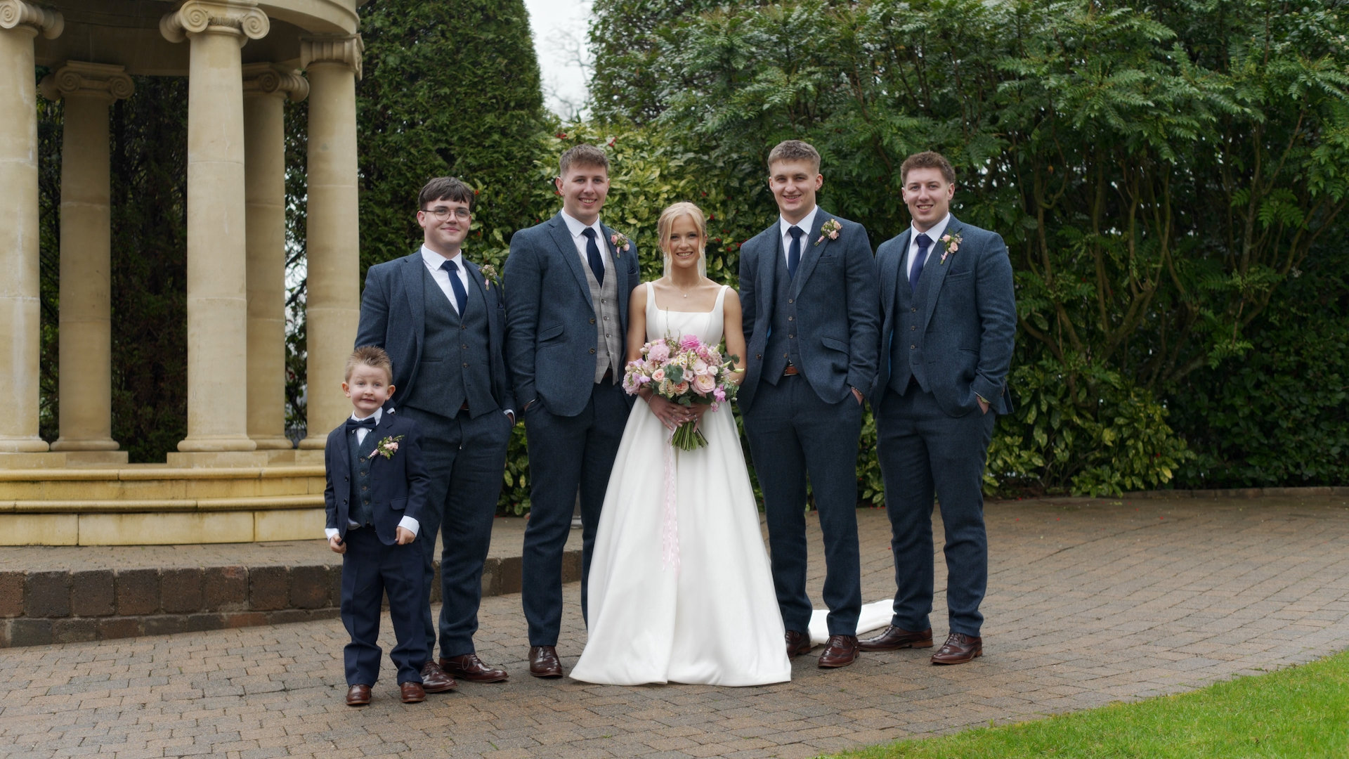 Hannah and Marc with their wedding party at the Tullyglass Hotel gazebo, Ballymena.