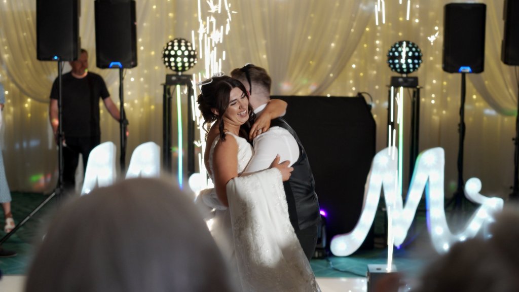 A candid image of Charlene and Kyle during their first dance at the Roe Valley Resort